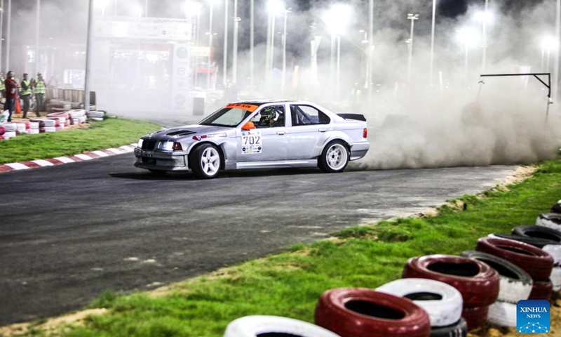 A competitor performs during the drift challenge of Misr International Motorsport Championship in New Alamein City, Egypt, Aug. 19, 2023. (Xinhua/Ahmed Gomaa)