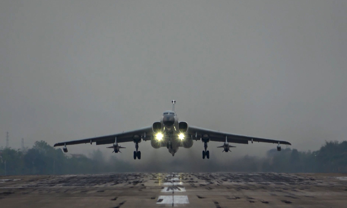 A H-6K bomber takes off from an airport to join the military drill conducted by the PLA Eastern Theater Command on Saturday. Photo: 81.cn