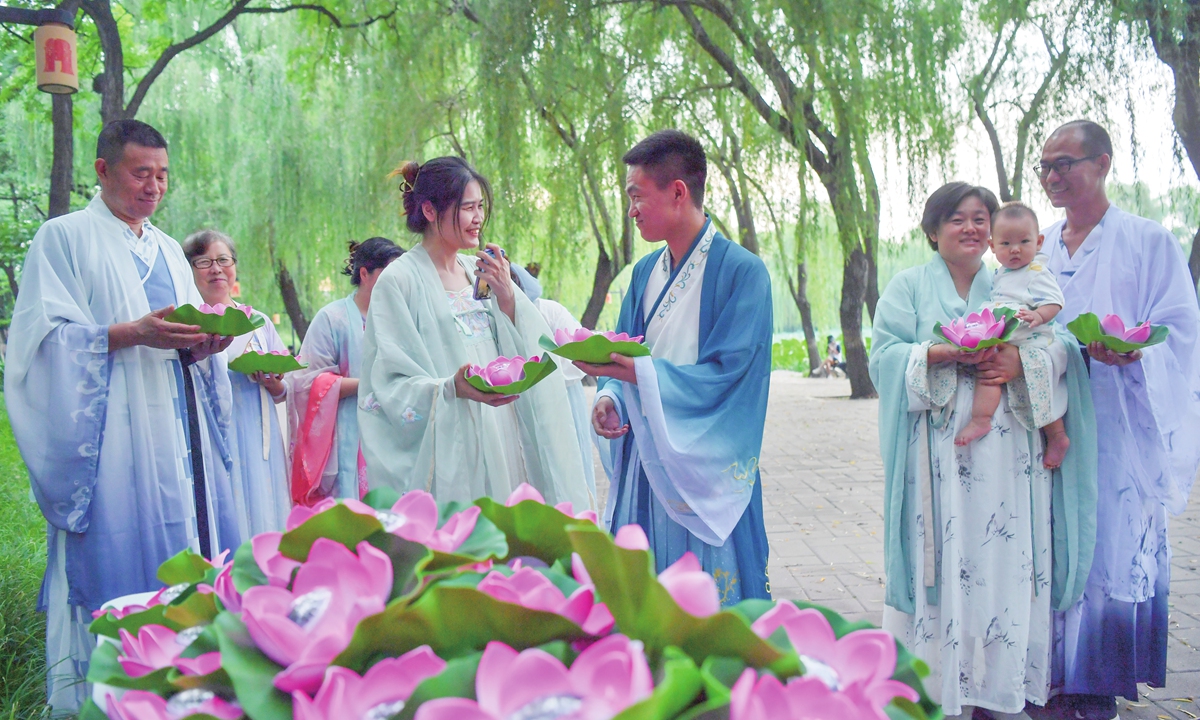 People in traditional hanfu participate in a Qixi event at Yuanmingyuan Park on August 20 in Beijing. Photo: VCG