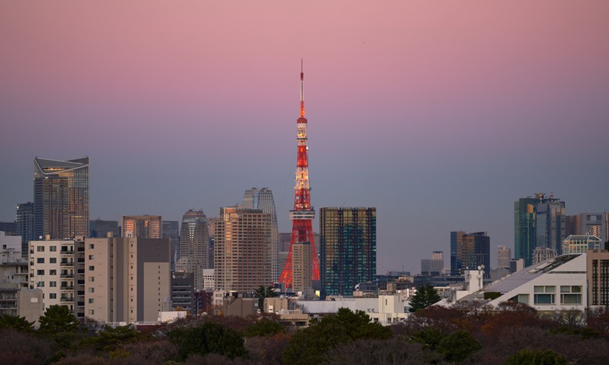This photo taken on Dec. 19, 2022 shows a view of the Tokyo Tower at sunset in Tokyo, Japan. (Xinhua/Zhang Xiaoyu)


