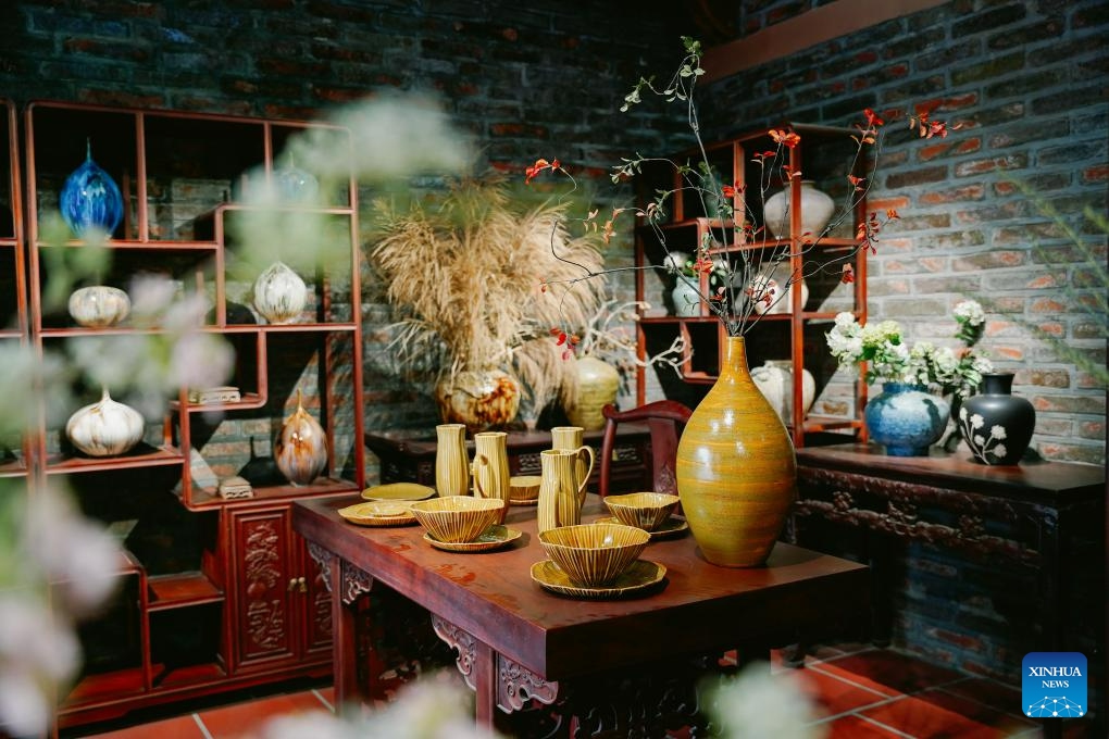 This photo taken on Aug. 19, 2023 shows pottery exhibits displayed inside Bat Trang Pottery Museum in Bat Trang Pottery Village, Gia Lam district, Hanoi, Vietnam. Bat Trang has a long history of porcelain and pottery making. The village's ceramic and pottery products are well known for high quality and abundant styles.(Photo: Xinhua)