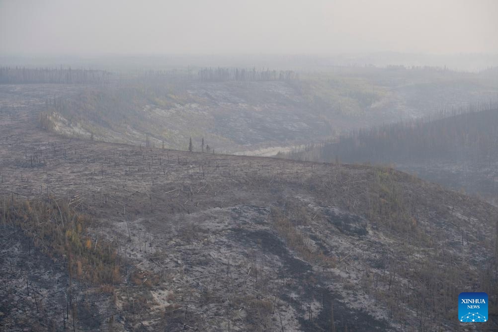 This photo taken on Aug. 21, 2023 shows a large expanse of scorched land near Hay River in Northwest Territories, Canada.(Photo: Xinhua)