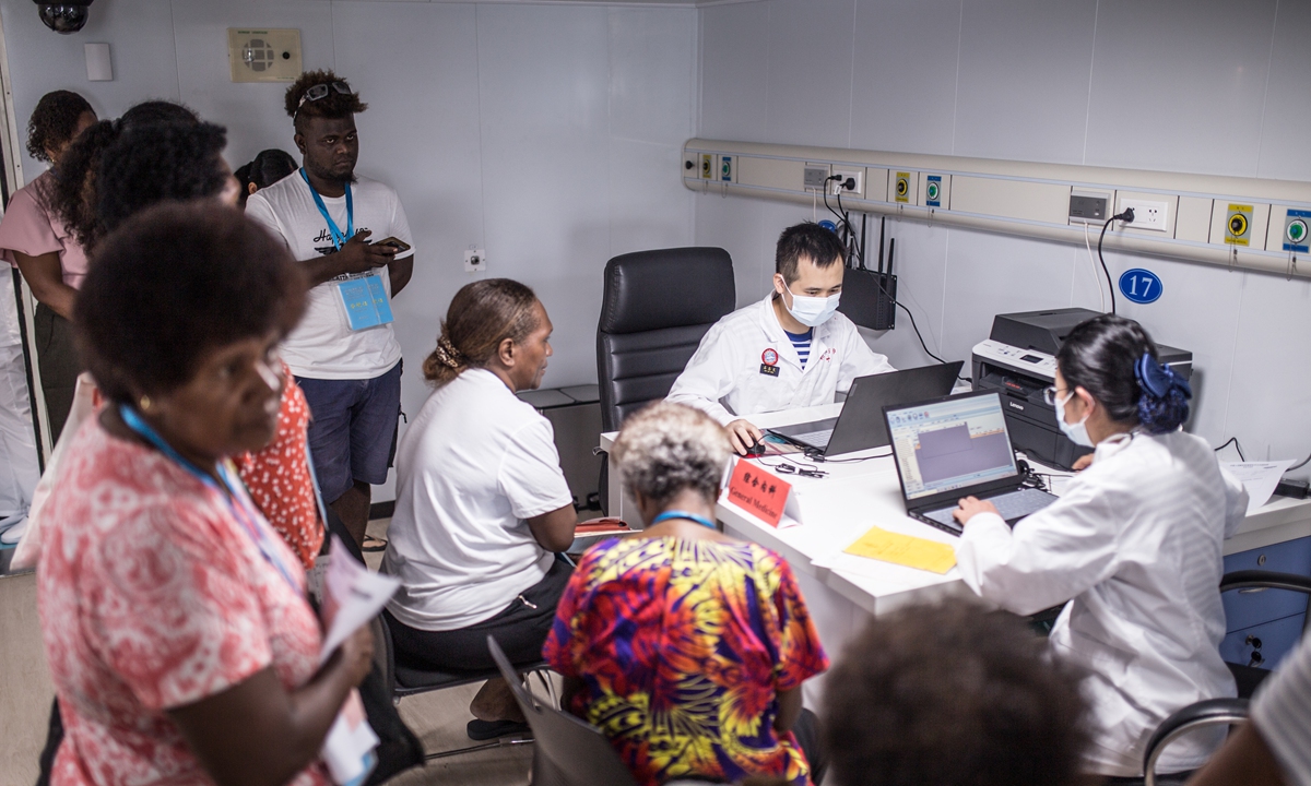 Chinese medical experts treat patients on the <em>Ark Peace</em> on August 20, 2023, in Honiara Photo: Shan Jie/GT