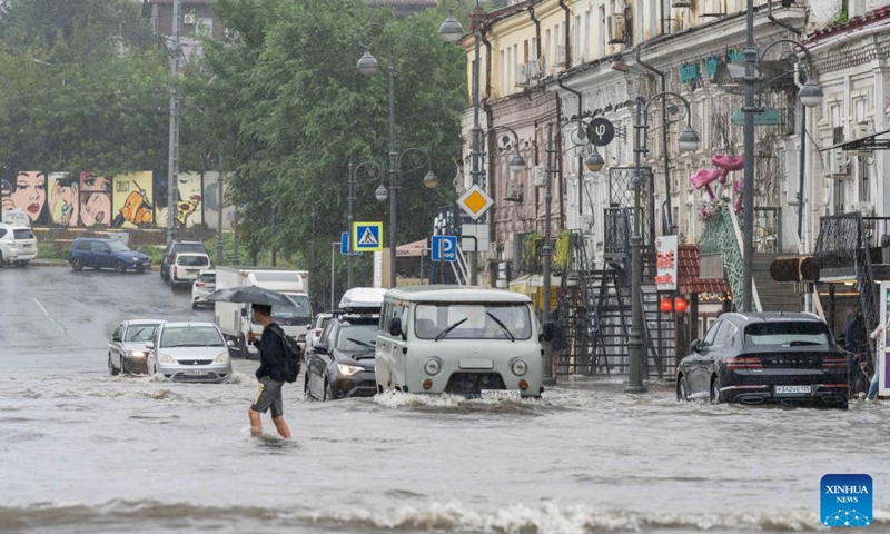 A street is flooded by rainwater in downtown Vladivostok, Russia, Aug. 23, 2023. The city experienced torrential rain on Wednesday, causing flooding in low-lying areas of the urban area.(Photo: Xinhua)