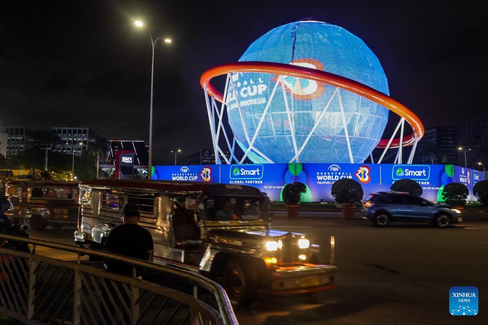 A giant FIBA Basketball World Cup themed display is seen in Pasay City, the Philippines, Aug. 24, 2023. The FIBA Basketball World Cup 2023 will be held from Aug. 25 to Sept. 10, 2023.(Photo: Xinhua)
