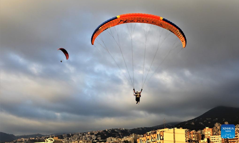 People paraglide over the city of Jounieh, Lebanon, on Aug. 26, 2023. Photo: Xinhua