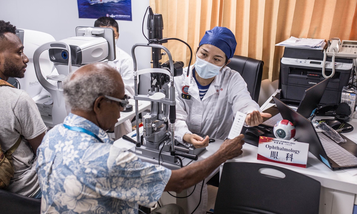 A Chinese naval ophthalmologist examines the eyes of an elderly Solomon Islands man on August 21, 2023 in Honiara. Photo: Shan Jie/GT
