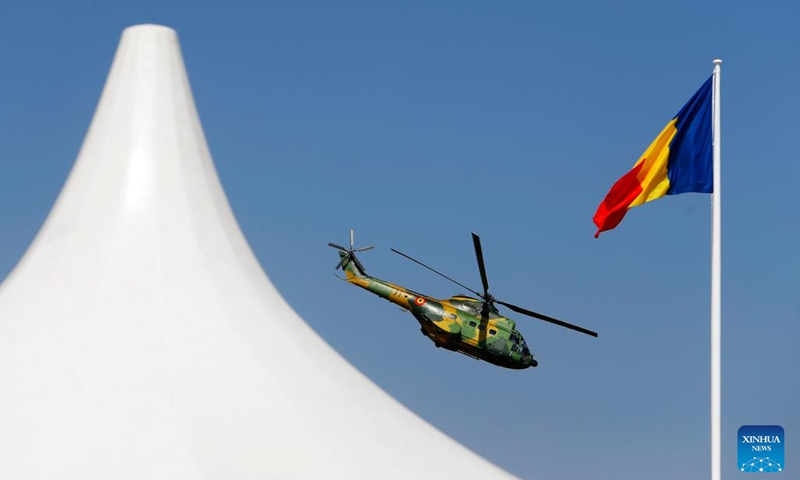 A military helicopter of Romanian Air Force performs during the 2023 Bucharest International Air Show & General Aviation Exhibition in Bucharest, Romania, Aug. 26, 2023. Photo: Xinhua