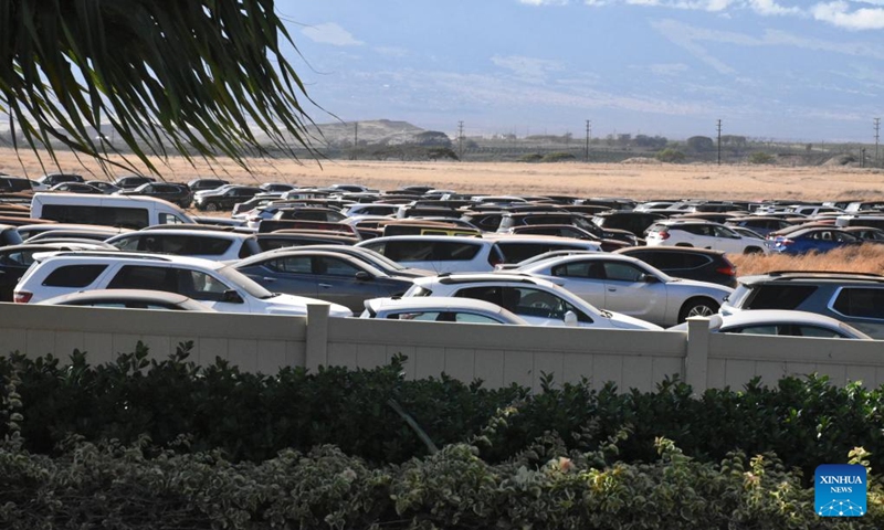 Photo taken on Aug. 24, 2023 shows rental cars sit unused in a parking lot near Kahului Airport in Maui, Hawaii, the United States. The devastating wildfires that ravaged the Hawaiian island of Maui were a bitter blow to the island's tourism industry, but local residents and business leaders expect more tourists will come back as the island embarks on a long road ahead for recovery. Photo: Xinhua