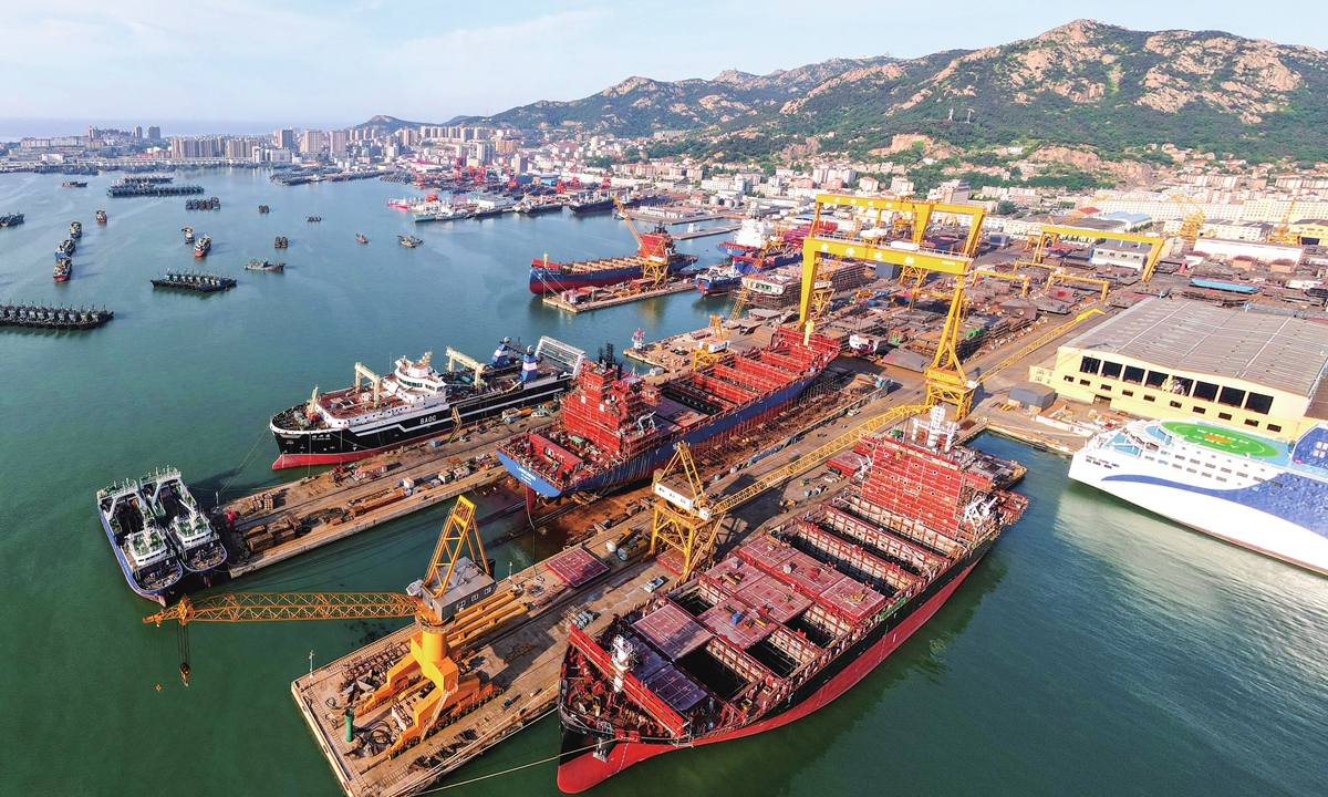 Ships under construction berth in a dock of a local shipbuilding company in Rongcheng, East China's Shandong Province on May 25, 2023. Photo: VCG