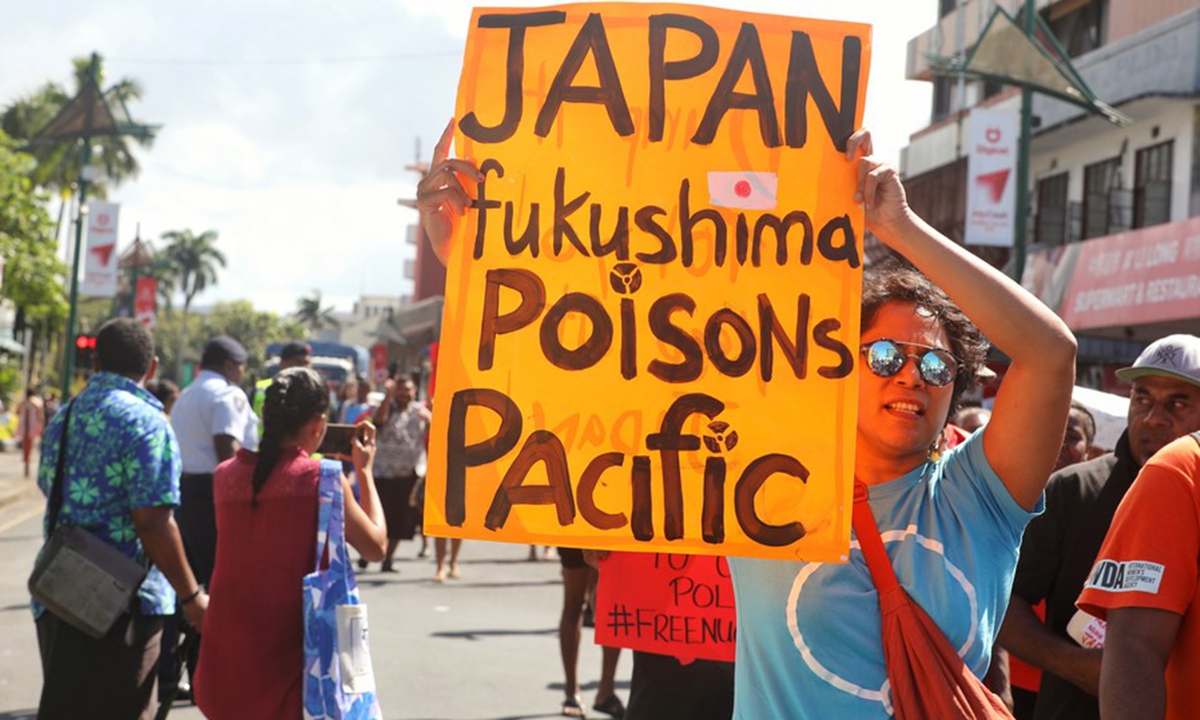People attend a rally against Japan's dumping of nuke wastewater in Suva, Fiji, Aug. 25, 2023. (Photo by Sang Qinlong/Xinhua)




