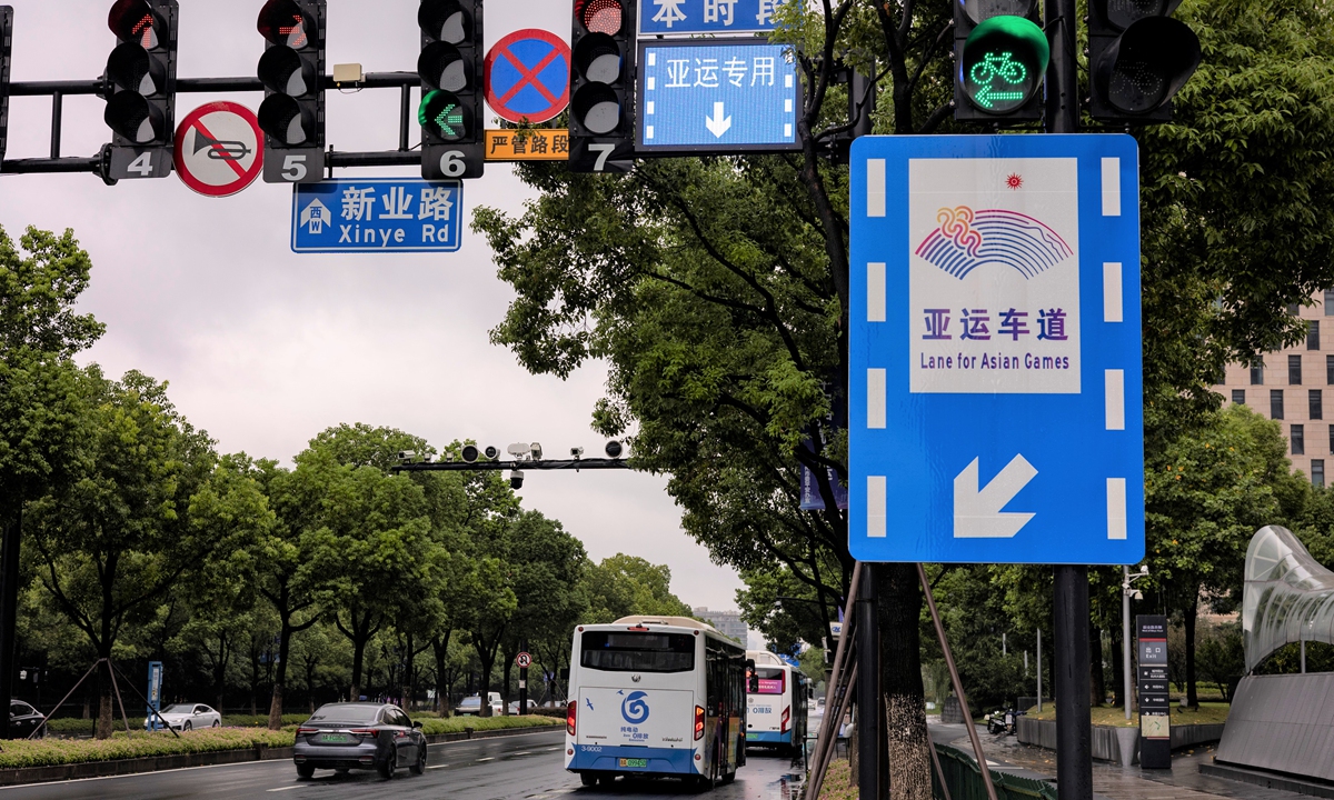 Signs indicate the lane for the Asian Games on a road in Hangzhou, East China's Zhejiang Province, on August 30, 2023. The Asian Games host city held a one-day comprehensive rehearsal for the upcoming event, which will be held from September 23 to October 8. Photo: VCG