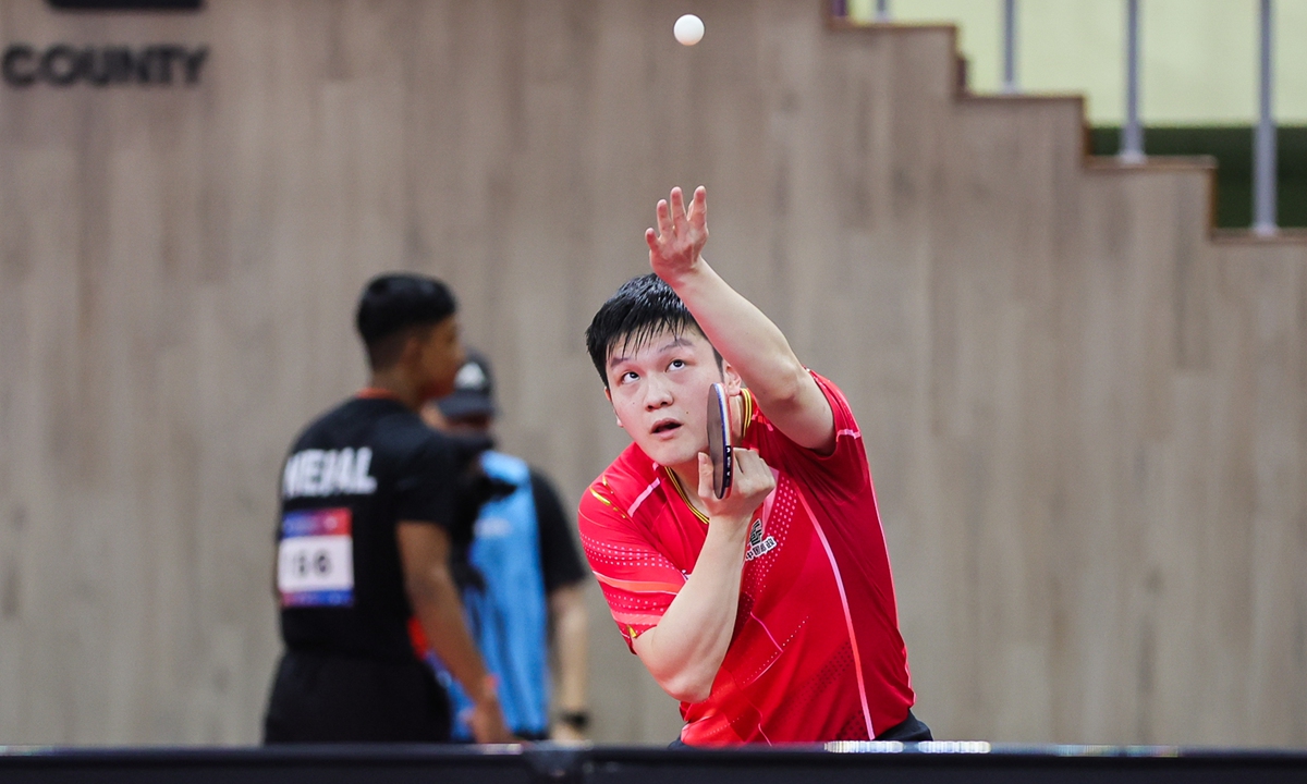 Chinese table tennis player Fan Zhendong serves the ball in the men's team event against Qatar at the Asian Table Tennis Championships match in Pyeongchang, South Korea on September 3, 2023. Team China won 3-0. Photo: VCG