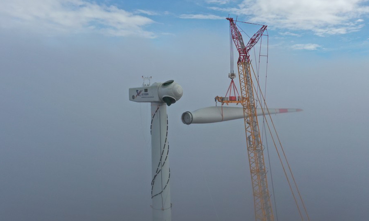 A wind turbine blade is installed at the construction site of the Senj Wind Farm in Senj, Croatia, Sept. 27, 2020.(Photo by Ding Decai/Xinhua)




