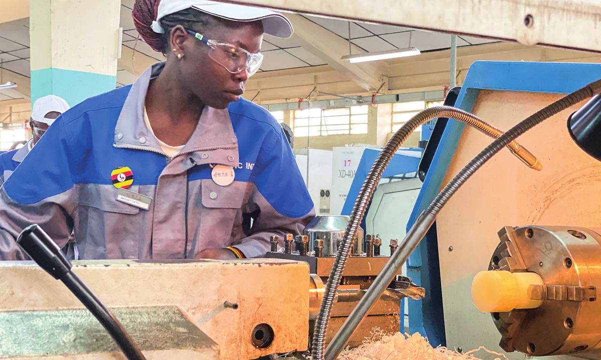 Faith Ariekot practices operating a machine. Photo: Liu Xin/GT