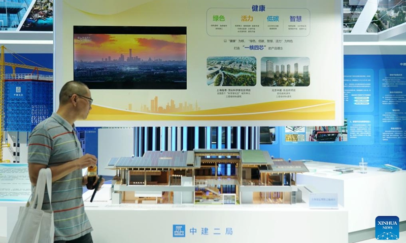 A visitor views a future city-themed exhibition booth at the environmental services exhibition of the 2023 China International Fair for Trade in Services (CIFTIS) in Beijing, capital of China, Sept. 2, 2023. Themed Opening-up leads development, cooperation delivers the future, the 2023 CIFTIS is being held in Beijing from Sept. 2 to 6 and features over 200 varied events, including forums, negotiations, and summits.(Photo: Xinhua)