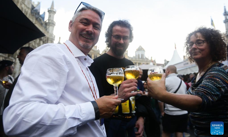 People enjoy beers at the 23rd Belgian Beer Weekend in Brussels, Belgium, Sept. 2, 2023. More than 500 Belgian beers were presented by 53 breweries to the public during the event. Photo: Xinhua