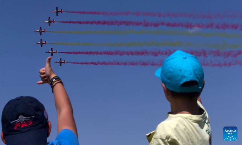 Spectators watch the performance of Spanish aircraft during an air show at the Tanagra Air Base, some 70 kilometers north of Athens, Greece on Sept. 2, 2023. Athens Flying Week 2023 was held on Sept. 2 and Sept. 3 at the Tanagra Air Base. Photo: Xinhua