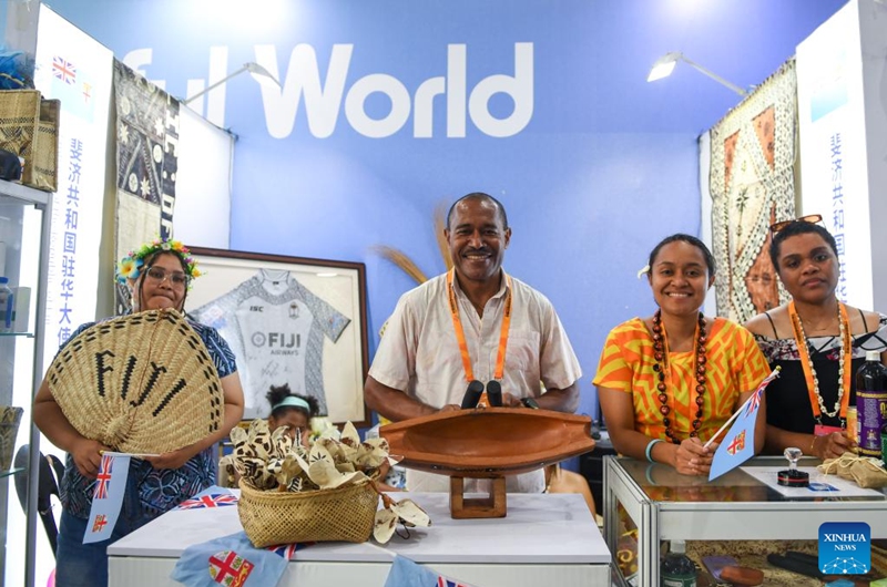 Staff members display Fijian instruments at the exhibition booth of the Fijian embassy in China at the 8th Colourful World -- Cultural Exhibition of Countries along the Belt and Road during the 2023 China International Fair for Trade in Services (CIFTIS) in Beijing, capital of China, Sept. 2, 2023. Photo: Xinhua