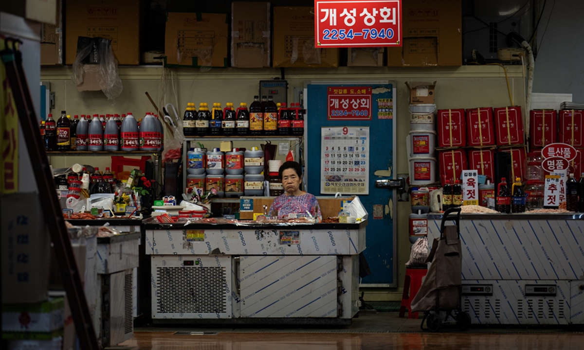 A vendor of salted seafood sits at her store at Noryangjin Fisheries Wholesale Market in Seoul, Friday. Korea Times photo by Choi Won-suk