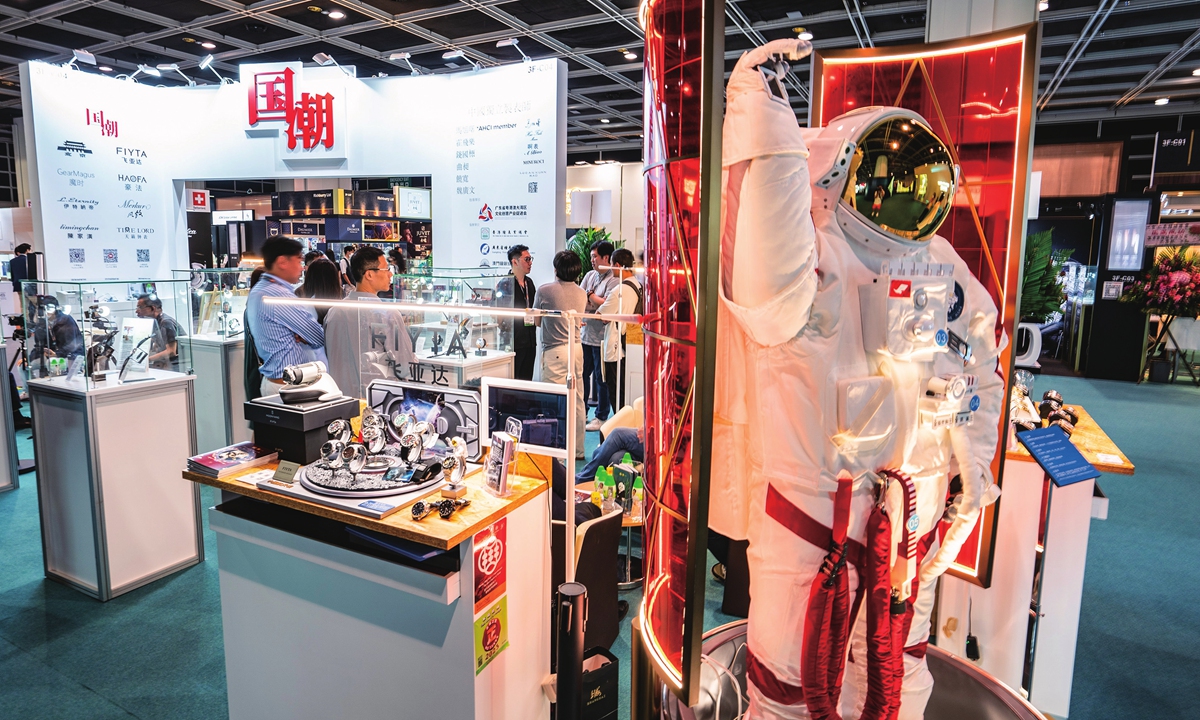Visitors browse watches that incorporate elements of Chinese culture at a watch fair held in Hong Kong on September 5, 2023. More than 700 watchmakers from 17 countries and regions have gathered at the five-day event. This year, the exhibition has added a new theme of 