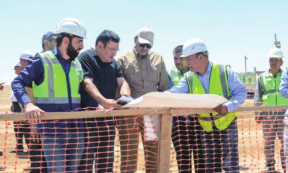 Prime Minister of Uzbekistan Abdulla Aripov (center) visits the Zarafshan 500MW Wind Power Project, on June 23, 2023. Photo: Courtesy of SEPCOIII