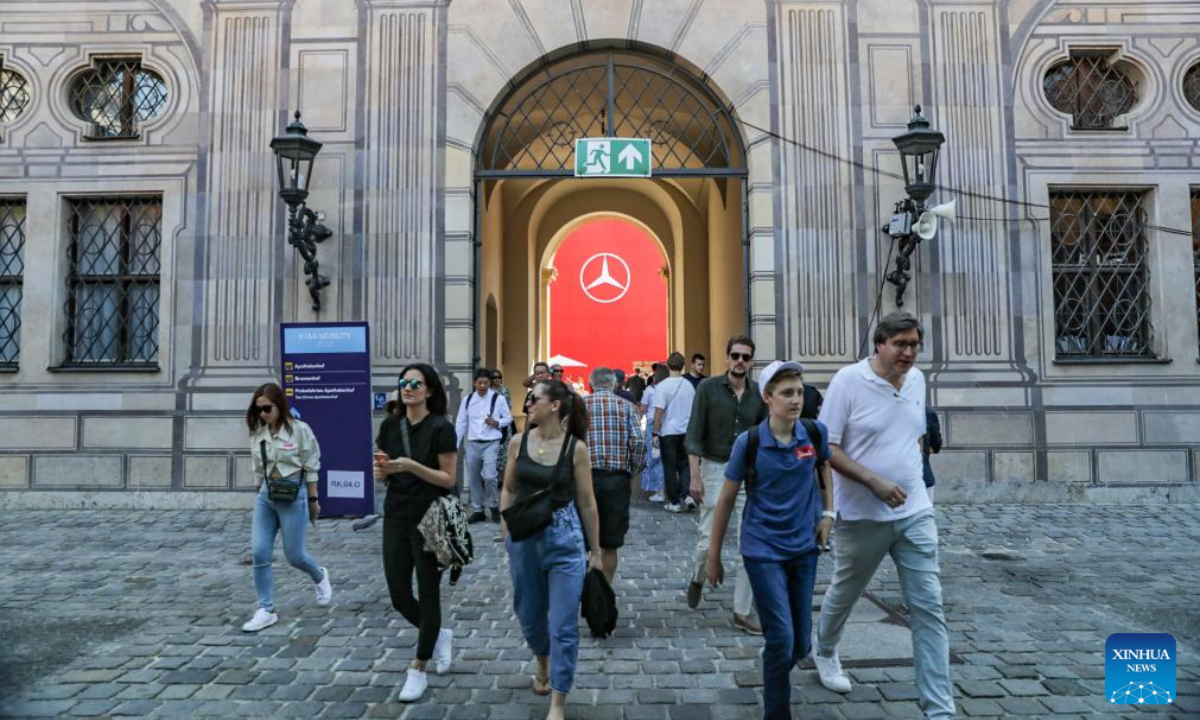 People leave the Mercedes-Benz booth at 2023 International Motor Show, officially known as the IAA MOBILITY 2023, in Munich, Germany, Sep 8, 2023. Photo:Xinhua