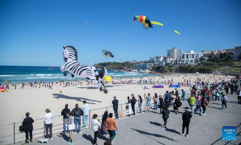 People fly kites at Bondi Beach in Sydney, Australia, Sept. 10, 2023. Kite lovers flocked to Sydney's famous Bondi Beach on Sunday for Australia's annual kite festival, the Festival of the Winds. (Photo by Hu Jingchen/Xinhua)
