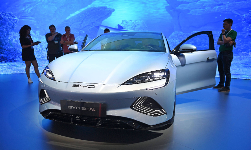 Visitors at the booth of the Chinese car manufacturer BYD at 2023 International Motor Show in Munich, Germany on September 8, 2023 Photo: VCG