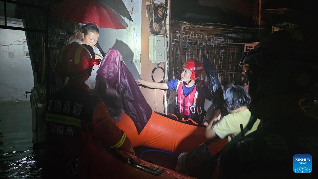 Rescuers transfer trapped villagers in Taijiang District of Fuzhou, southeast China's Fujian Province, Sept. 6, 2023. Typhoon Haikui, the 11th typhoon of this year, made landfall in the coastal areas of Fujian Province on Tuesday. Multiple areas of Fuzhou experienced heavy rainstorms starting from 9 p.m. Tuesday, with cumulative precipitation from 9 p.m. Tuesday to 5 a.m. Wednesday breaking three-hour and six-hour maximum rainfall records of the Wushan national weather station.(Photo: Xinhua)