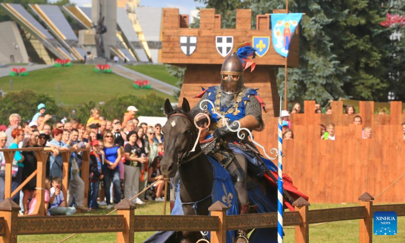 A man dressed as knight takes part in Minsk City Day celebrations in Minsk, Belarus, Sept. 9, 2023. Various activities were held on Saturday to celebrate the 956th founding anniversary of Minsk. (Photo by Henadz Zhinkov/Xinhua)