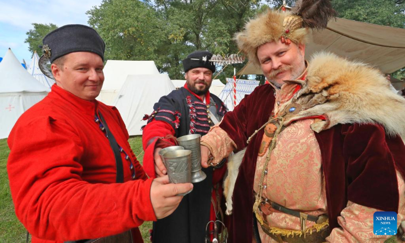 Dressed-up people take part in Minsk City Day celebrations in Minsk, Belarus, Sept. 9, 2023. Various activities were held on Saturday to celebrate the 956th founding anniversary of Minsk. (Photo by Henadz Zhinkov/Xinhua)