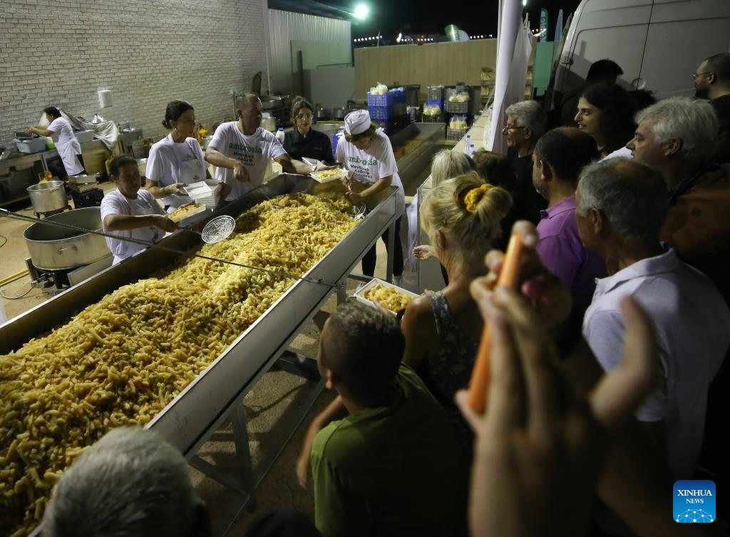 People attend an international potato festival in the village of Xylofagou, Cyprus, on Sept. 7, 2023. An international potato festival kicked off on Thursday in the village of Xylofagou, which is renowned for its potato production.(Photo: Xinhua)