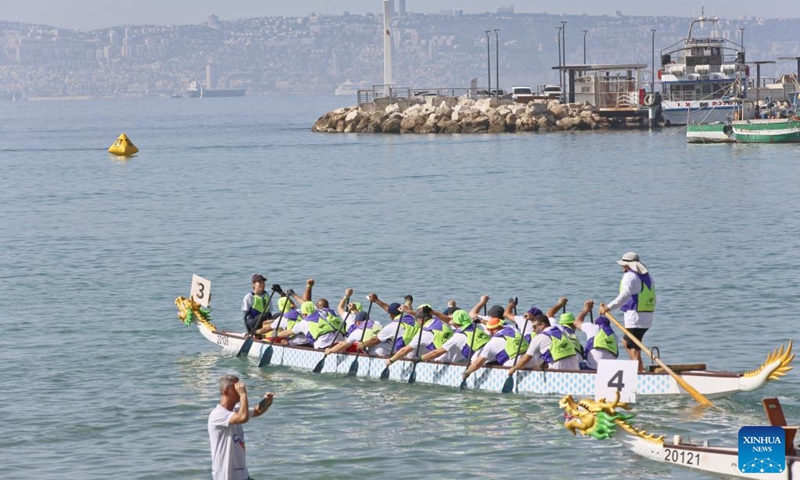 Participants compete during a dragon boat race in Akko, Israel, on Sept. 8, 2023. A dragon boat race was held in northern Israel on Friday, with hundreds of paddlers from 17 teams nationwide competing in the Mediterranean Sea. Photo: Xinhua