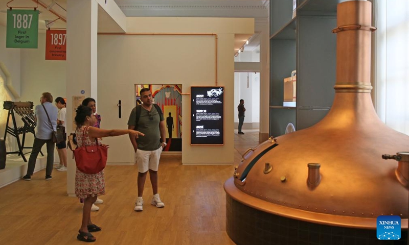 People visit the Belgian Beer World in Brussels, Belgium, Sept. 9, 2023. The Belgian Beer World, which showcases Belgium's brewing tradition through a series of interactive exhibits and workshops, opened its doors to the public here on Saturday. Photo: Xinhua