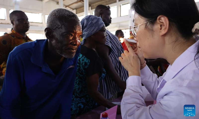 A Chinese doctor checks up on a local patient in the Akuse community in the Eastern Region, Ghana, Sept. 8, 2023. Photo: Xinhua