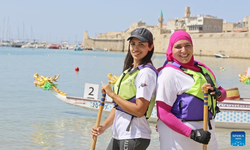 Participants pose for photos during a dragon boat race in Akko, Israel, on Sept. 8, 2023. A dragon boat race was held in northern Israel on Friday, with hundreds of paddlers from 17 teams nationwide competing in the Mediterranean Sea. Photo: Xinhua