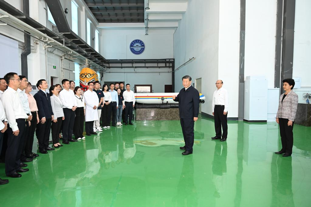General Secretary of the Communist Party of China Central Committee Xi Jinping, also Chinese president and chairman of the Central Military Commission, talks with representatives of faculty members and students while inspecting Harbin Engineering University in Harbin, northeast China's Heilongjiang Province, Sept. 7, 2023. Xi inspected northeast China's Heilongjiang Province from Wednesday to Friday. Photo: Xinhua