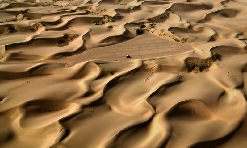 This aerial photo taken on Sept. 7, 2023 shows the scenery of a desert scenic spot in Makit County of Kashgar, northwest China's Xinjiang Uygur Autonomous Region. Makit County, located on the southwestern rim of the Taklimakan Desert, has taken advantage of its natural resources to develop tourism and provide jobs for the local people. Photo: Xinhua