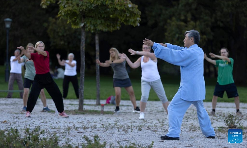 Participants practise Qigong a day before the World Health Qigong Day at the Tivoli park in Ljubljana, Slovenia, on Sept. 8, 2023. The World Health Qigong Day is celebrated each year on the second Saturday in September in many countries. Photo: Xinhua