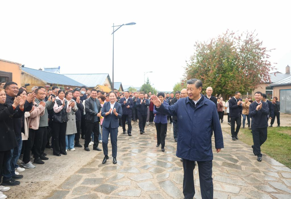 General Secretary of the Communist Party of China Central Committee Xi Jinping, also Chinese president and chairman of the Central Military Commission, greets local residents while inspecting the Beijicun, or North Pole Village, a riverside border village, in Mohe, northeast China's Heilongjiang Province, Sept. 6, 2023. Xi inspected northeast China's Heilongjiang Province from Wednesday to Friday. Photo: Xinhua