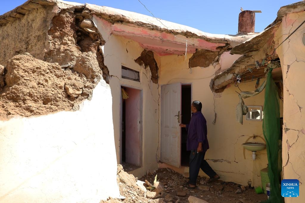 A man checks the damage to his house near the epicenter of an earthquake in Amizmiz, Morocco, Sept. 10, 2023. The death toll from the deadly earthquake in Morocco has risen to 2,497, with another 2,467 people injured, according to the latest update from the Moroccan Interior Ministry on Monday.(Photo: Xinhua)