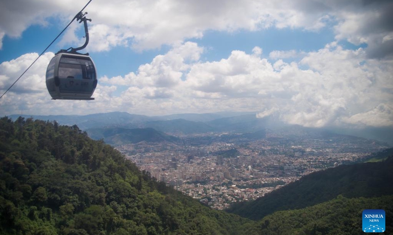 A cable car is seen at the Avila mountain in Caracas, Venezuela, Dec. 28, 2018. Venezuela lies along South America's Caribbean coast, bordering Brazil, Colombia and Guyana. The country has rich mineral resources and its oil and gas reserves rank among the top worldwide.(Photo: Xinhua)