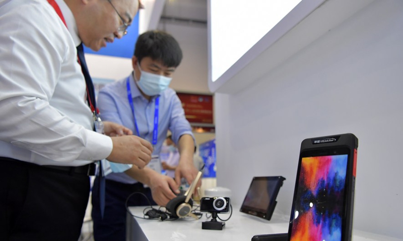 Photo taken on May 27, 2021 shows a smartphone based on the BeiDou Navigation Satellite System, which can be applied to disaster relief operations in uninhabited regions, during the 12th China Satellite Navigation Expo (CSNE) in Nanchang, capital of east China's Jiangxi Province. (Xinhua/Peng Zhaozhi)