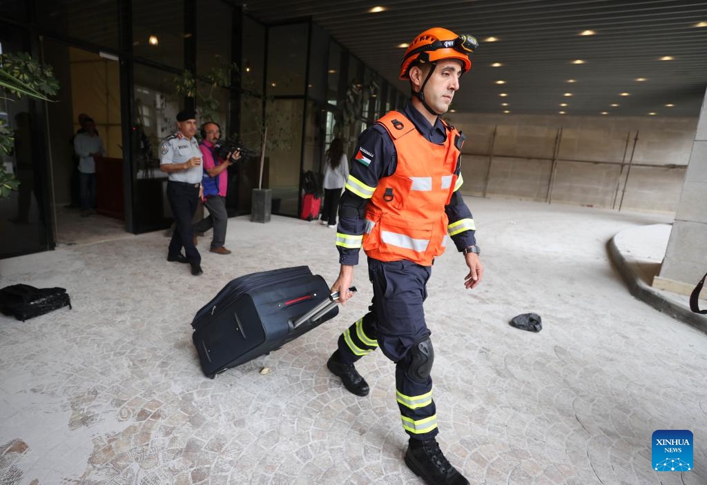 A rescuer of a Palestinian rescue team prepares before departing for Libya, in the West Bank city of Ramallah, on Sept. 13, 2023. Palestine on Wednesday sent a rescue team to eastern Libya where was struck by devastating floods. According to official data, at least 5,300 people are feared dead and over 10,000 more missing after the floods, which were triggered by Mediterranean storm Daniel and hit eastern Libya on Sunday.(Photo: Xinhua)
