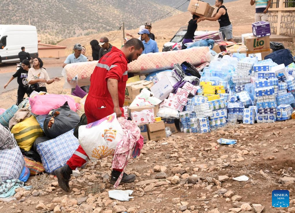 Rescuers carry supplies in Moulay of Al Haouz Province, Morocco, Sept. 12, 2023. The death toll from the devastating earthquake in Morocco has risen to 2,901, and the injuries to 5,530, according to the latest statement released by the Moroccan government on Tuesday.(Photo: Xinhua)