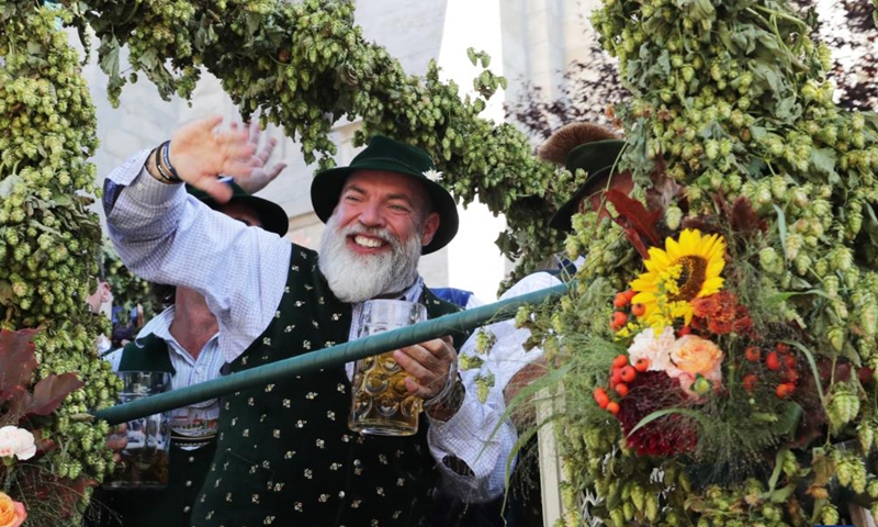 People attend the parade during the official opening of the Oktoberfest in Munich, Germany, Sept. 16, 2023. The 188th Oktoberfest, one of the largest folk festivals in Germany, officially opened here on Saturday. It is expected to conclude on Oct. 3. (Xinhua/Zhang Fan)
