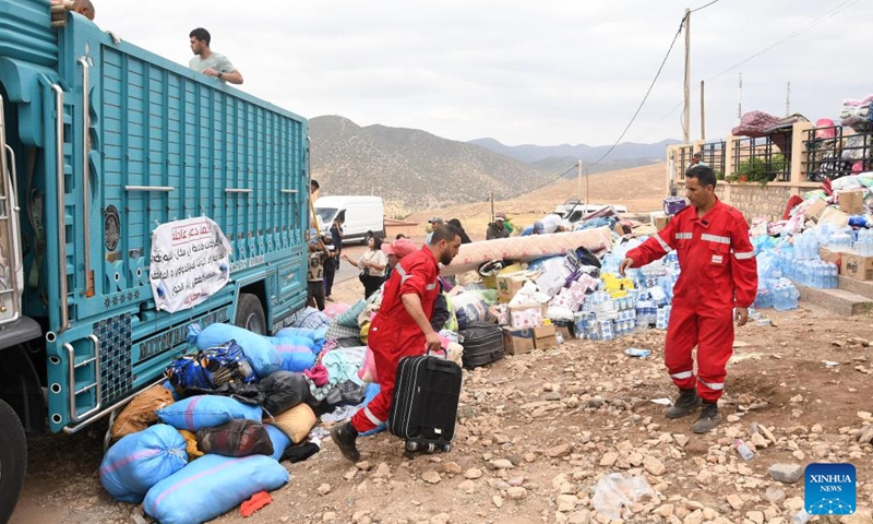 Rescuers carry supplies in Moulay of Al Haouz Province, Morocco, Sept. 12, 2023. The death toll from the devastating earthquake in Morocco has risen to 2,901, and the injuries to 5,530, according to the latest statement released by the Moroccan government on Tuesday.(Photo: Xinhua)