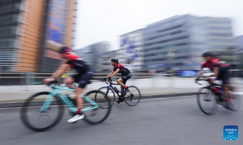 People ride bikes on Car Free Sunday in Brussels, Belgium, Sept. 17, 2023. The annual Car Free Sunday event was held in the Belgian capital on Sunday, offering the public an opportunity to rediscover the city using alternative means of transport. During the day, the whole Brussels Region is closed to traffic from 9:30 a.m. till 7 p.m., with the exception of public transport, taxis, emergency, police and persons with a special permit. (Xinhua/Zheng Huansong)