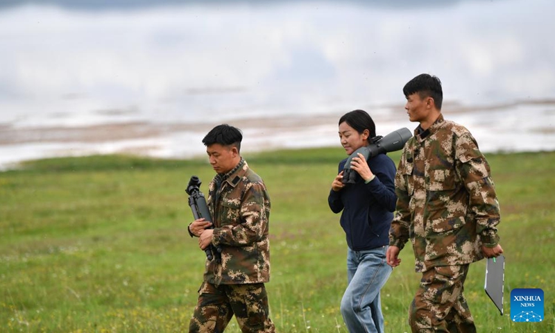 Staff members patrol the Gahai-Zecha National Nature Reserve in Gannan Tibetan Autonomous Prefecture, northwest China's Gansu Province, on July 7, 2023.（Photo: Xinhua)